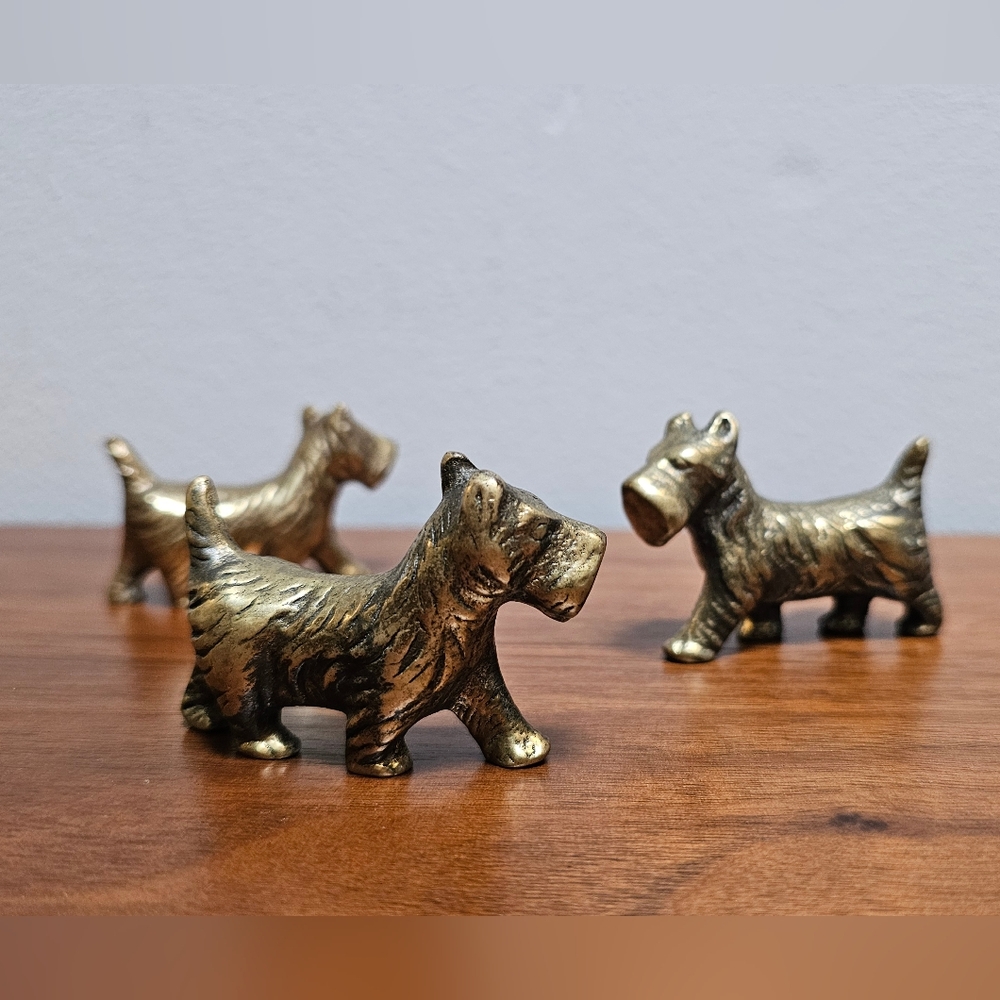 Set of 3 brass dog figurines